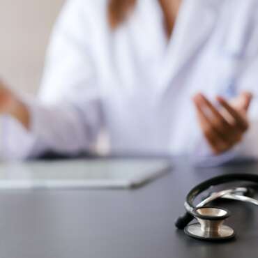 Doctors at hospital working in the doctor office.